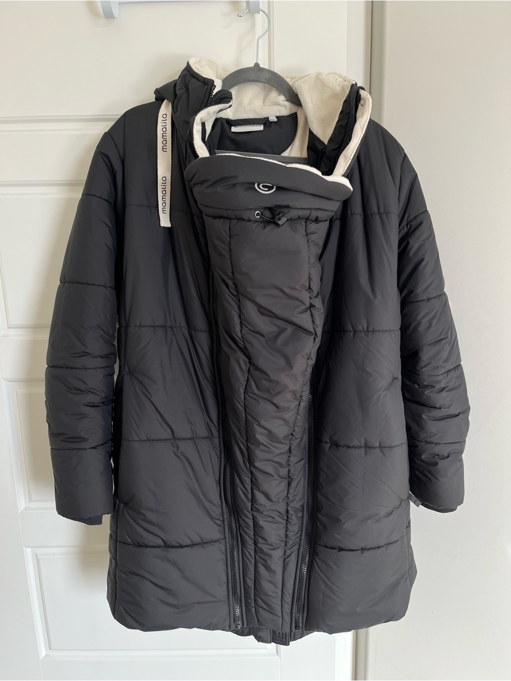Mamalila Copenhagen baby wearing winter puffer jacket